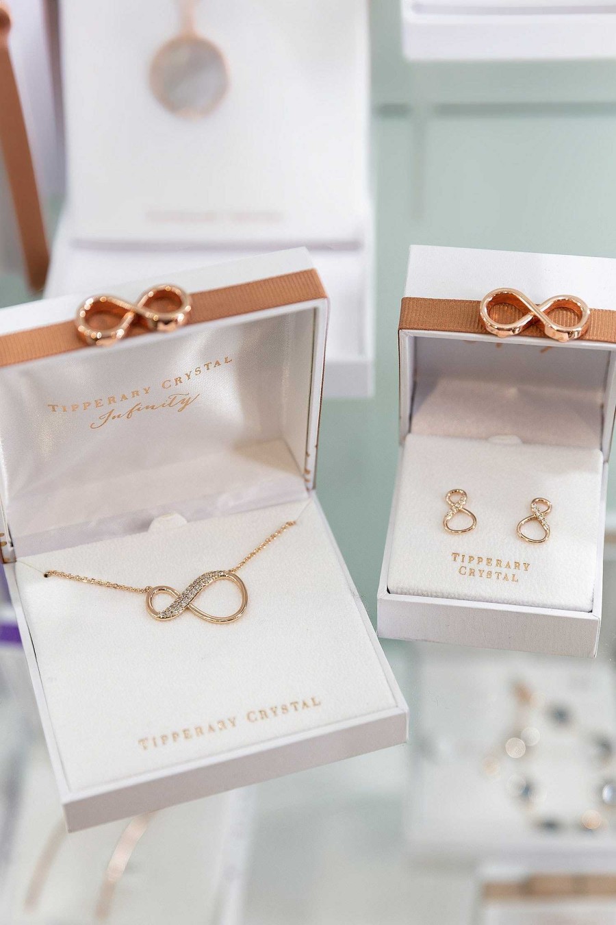 Her | Tipperary Crystal Jewellery 8 Shape Rose Gold Infinity Stud Earrings